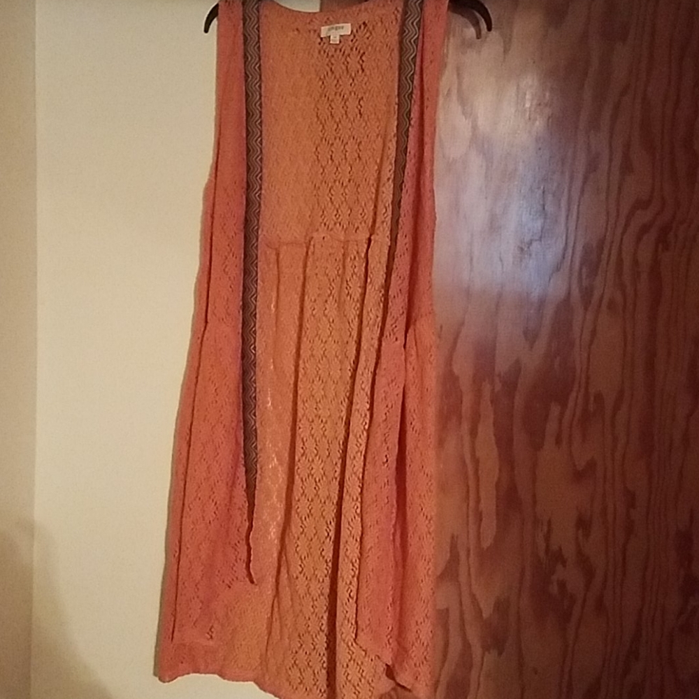 Long sleeveless vest